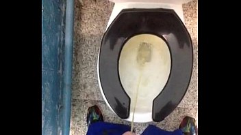 Fresh yellow morning piss in a public toilet